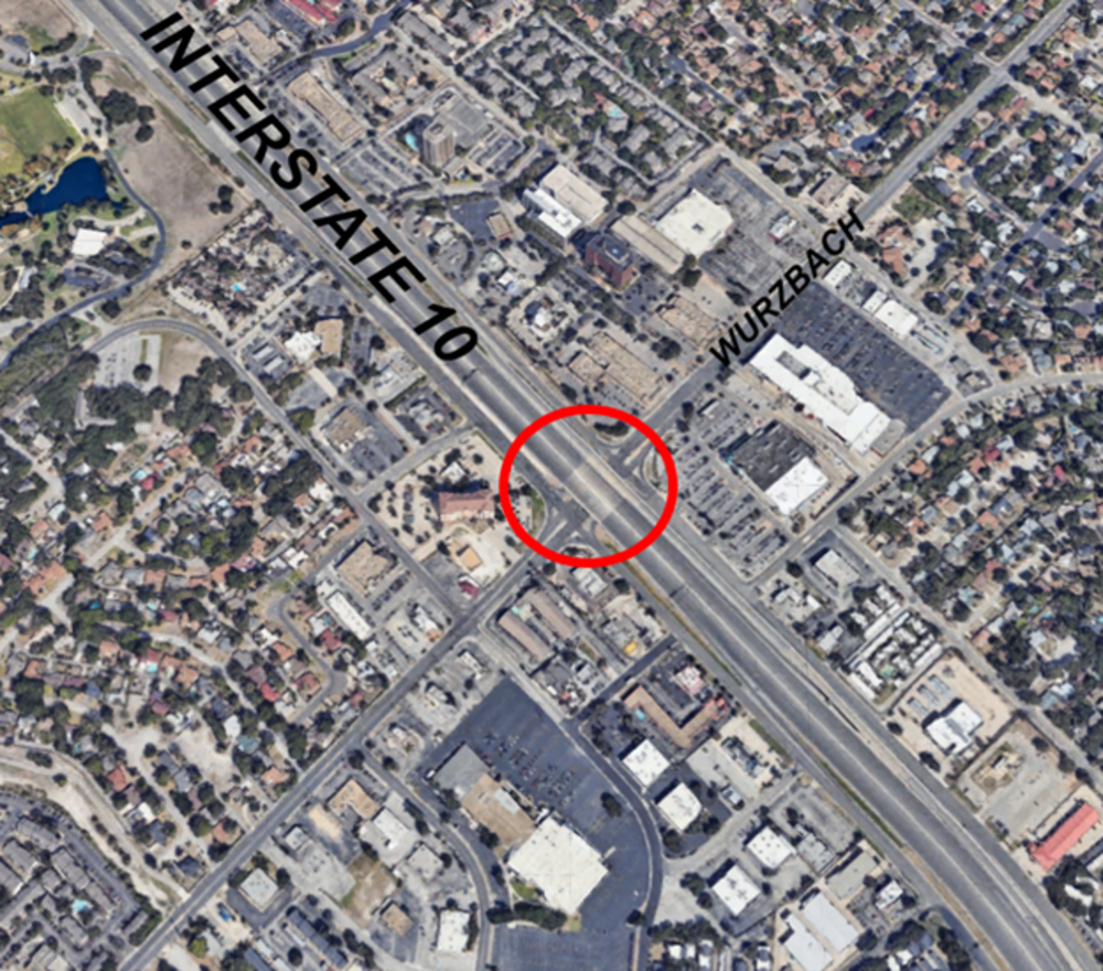 This photo shows a map of the Wurzbach and I10 intersection. A red circle indicates the project site location at 31396 Turnaround, San Antonio, TX 78230. | Esta fotografía muestra un mapa PASO A DESNIVEL DE WURZBACH E I10 con marcadores de color rojo que indican las ubicaciones del proyecto.